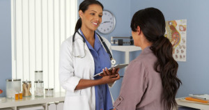 Doctor Speaking With Patient